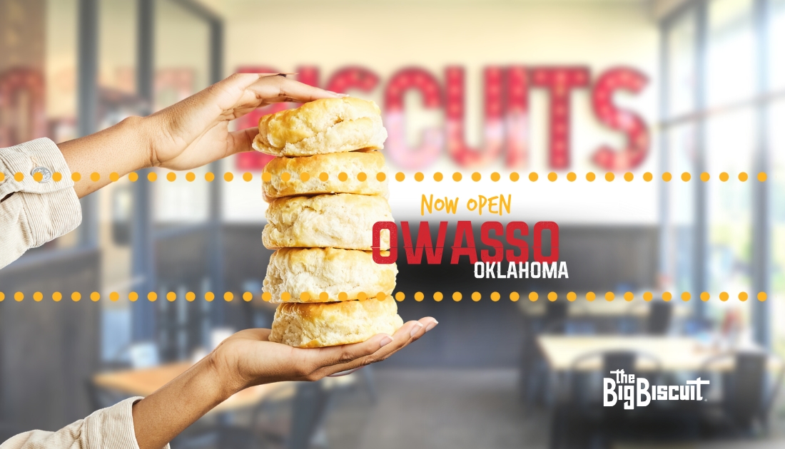 Text: Now Open - Owasso Oklahoma Background Image: Hands holding a stack of biscuits